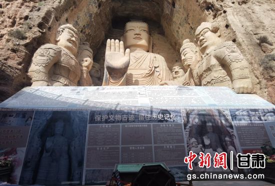 時下，中國“石窟鼻祖”天梯山石窟第13窟大佛足部與局部危巖體搶救性保護項目正在施工。圖為施工現(xiàn)場。陳曉斌 攝